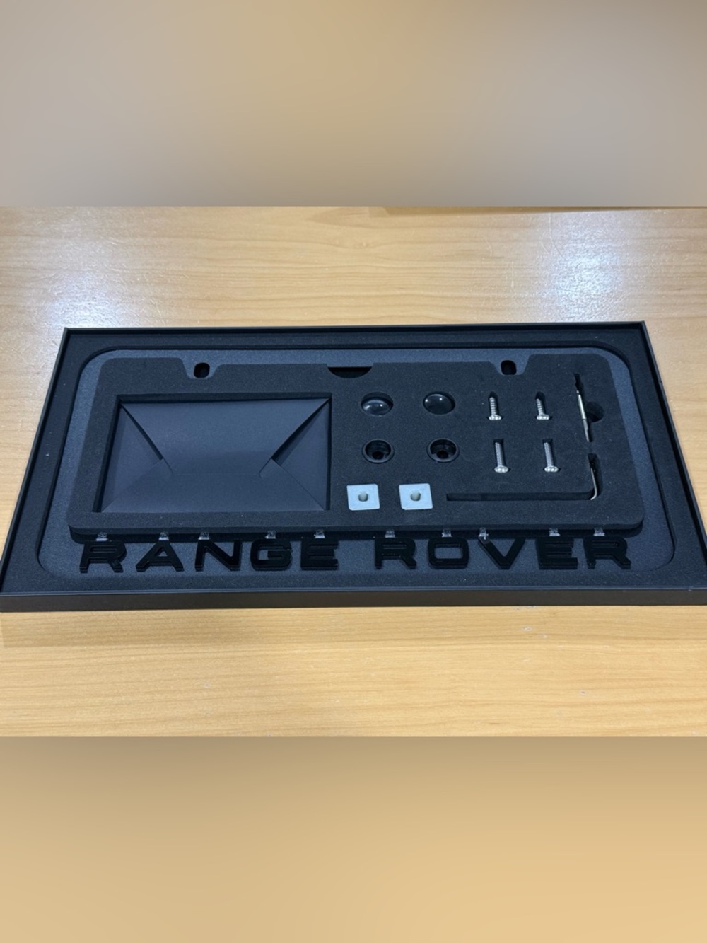 New ( open box) RR Black License Plate Frame with accessories.